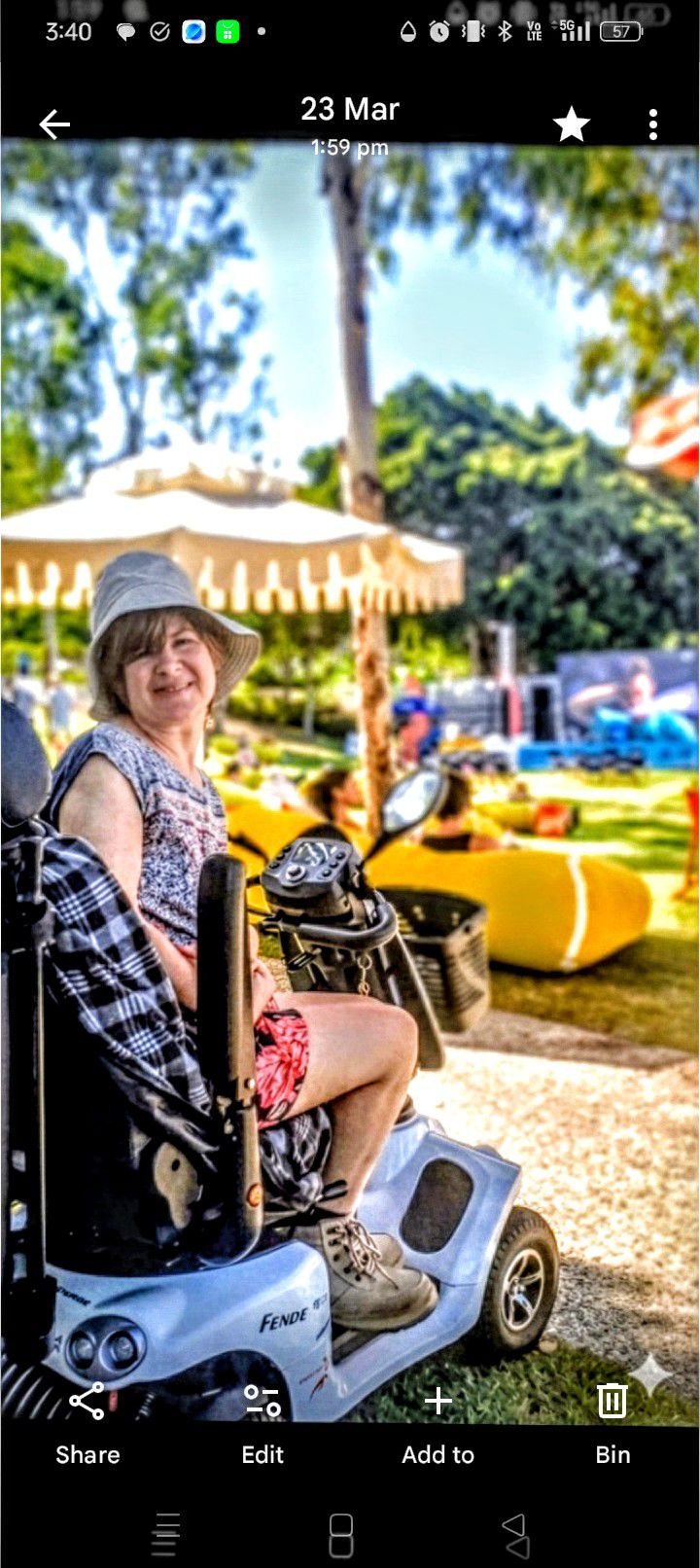 mild summer afternoon, the is Australian Open streamed on the outside Streaming Service proving by City Council. Tennis beanbags are stratigiccally placed under tress. iced drinks,iced lattes are aplenty..